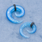Акриловые материальные тоннели берушей закручивают в спираль сияющий голубой цвет с кожаными обручами